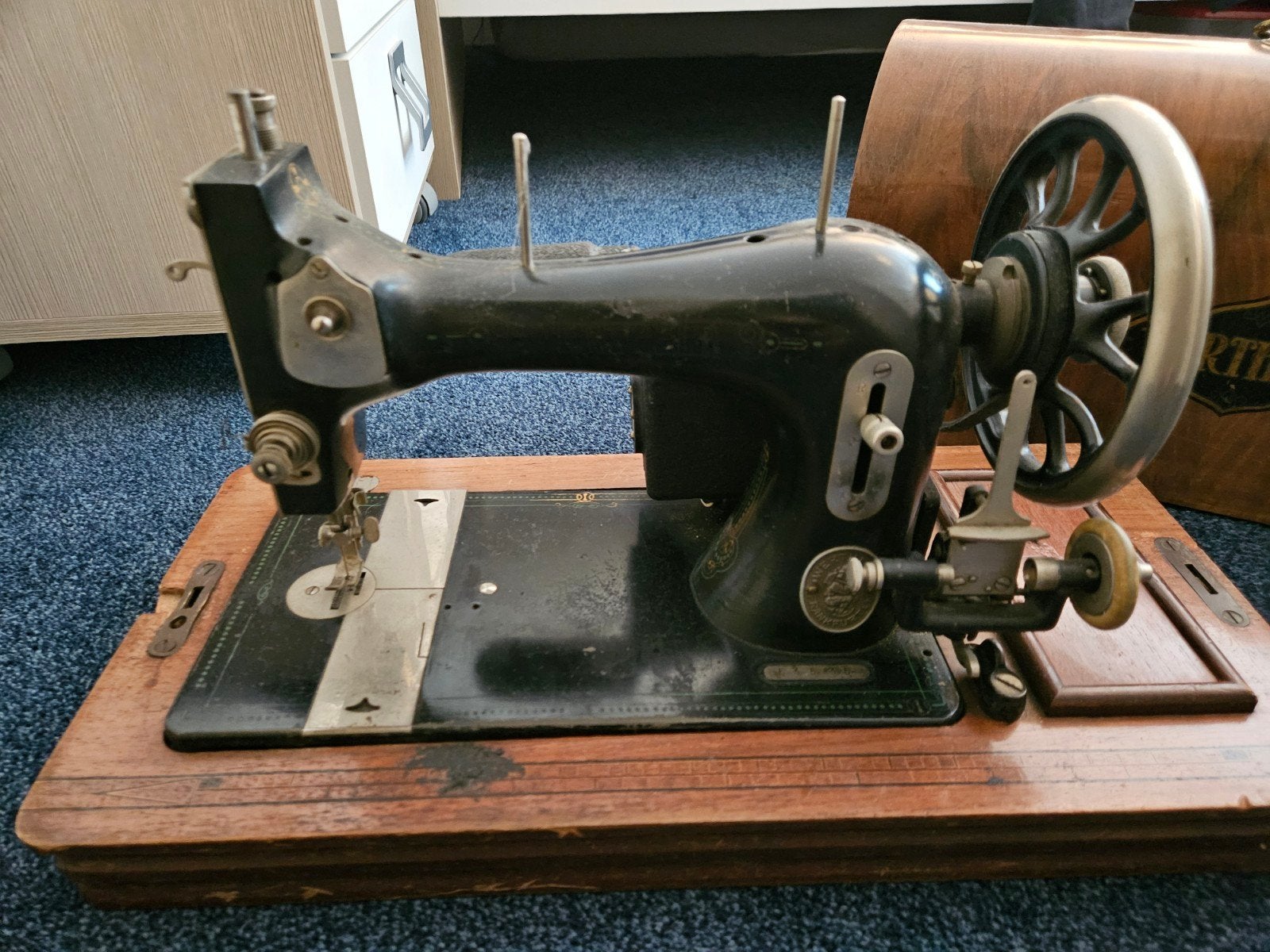 antieke wertheim naaimachine, Ophalen