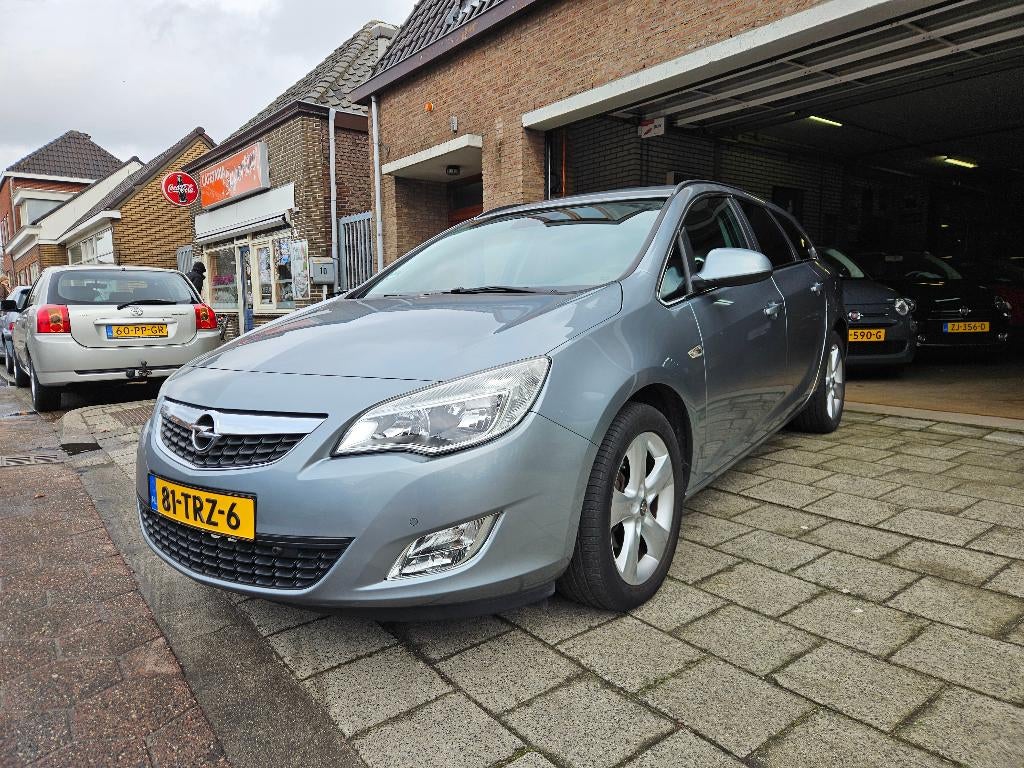 Opel Astra Sports Tourer 1.4 Turbo 88KW ST 2012 Grijs, Auto's, Voorwielaandrijving, Stof, 4 cilinders, 1337 kg
