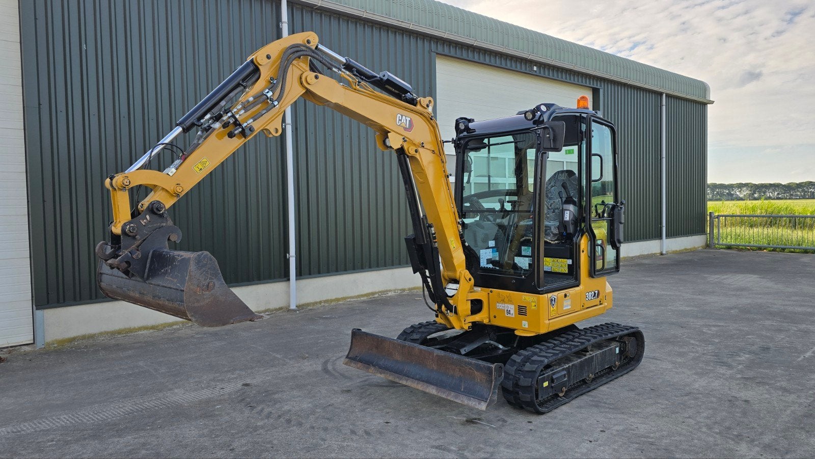 2023 Caterpillar 302.7 CR Minigraver - Zo goed als nieuw!, Zakelijke goederen, Machines en Bouw | Kranen en Graafmachines, Ophalen of Verzenden
