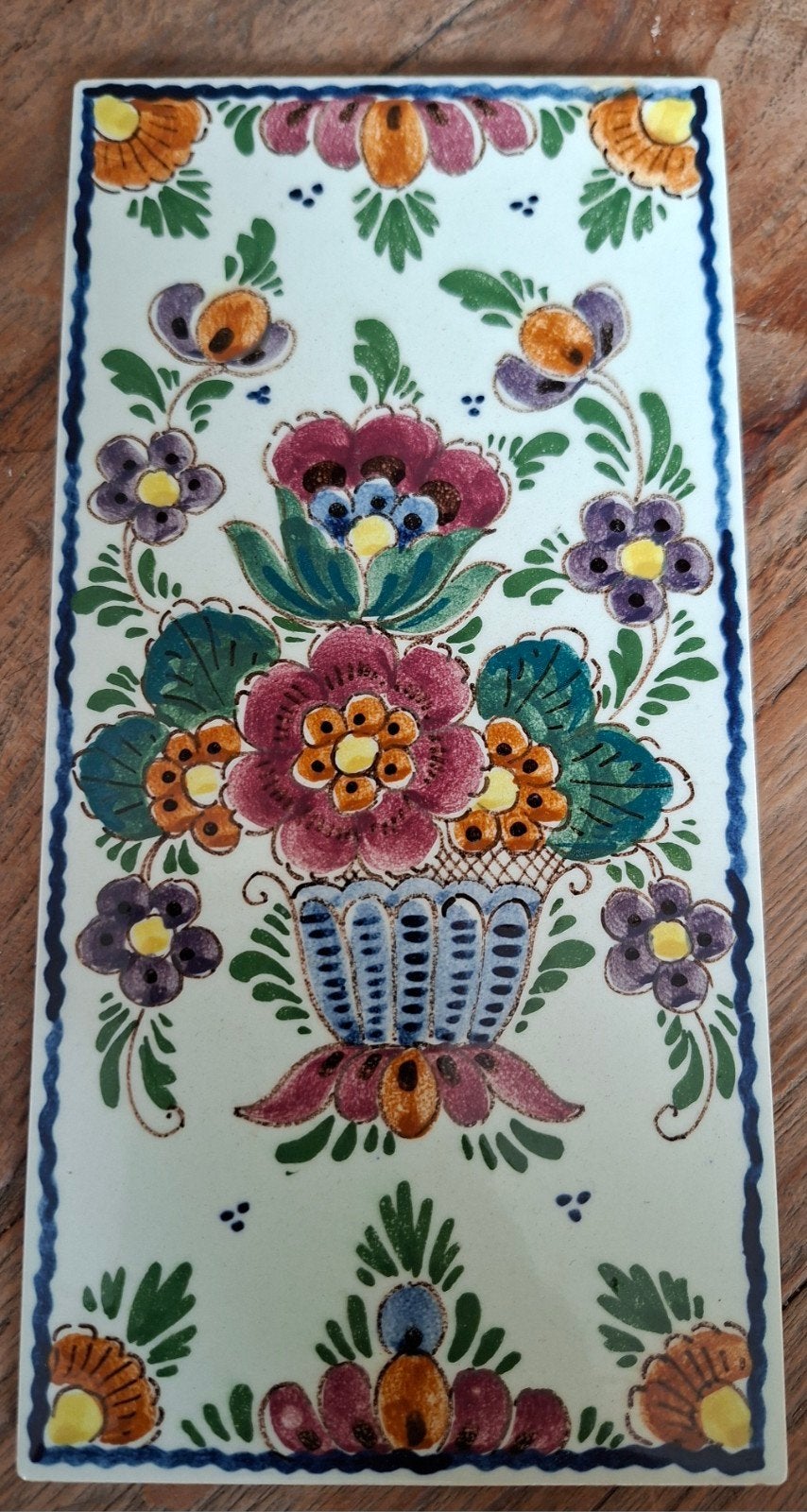 Makkum aardewerk tegel met bloemmotief, Antiek en Kunst, Ophalen of Verzenden
