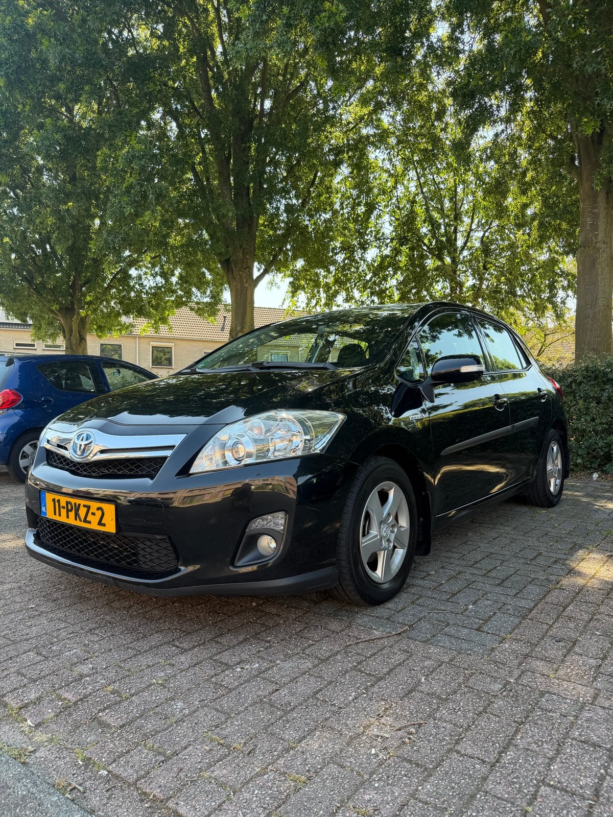 Toyota Auris 1.8 Full Hybrid 5DR CVT 2011 Zwart, Auto's, 4 cilinders, Zwart, Origineel Nederlands, 75 €/maand