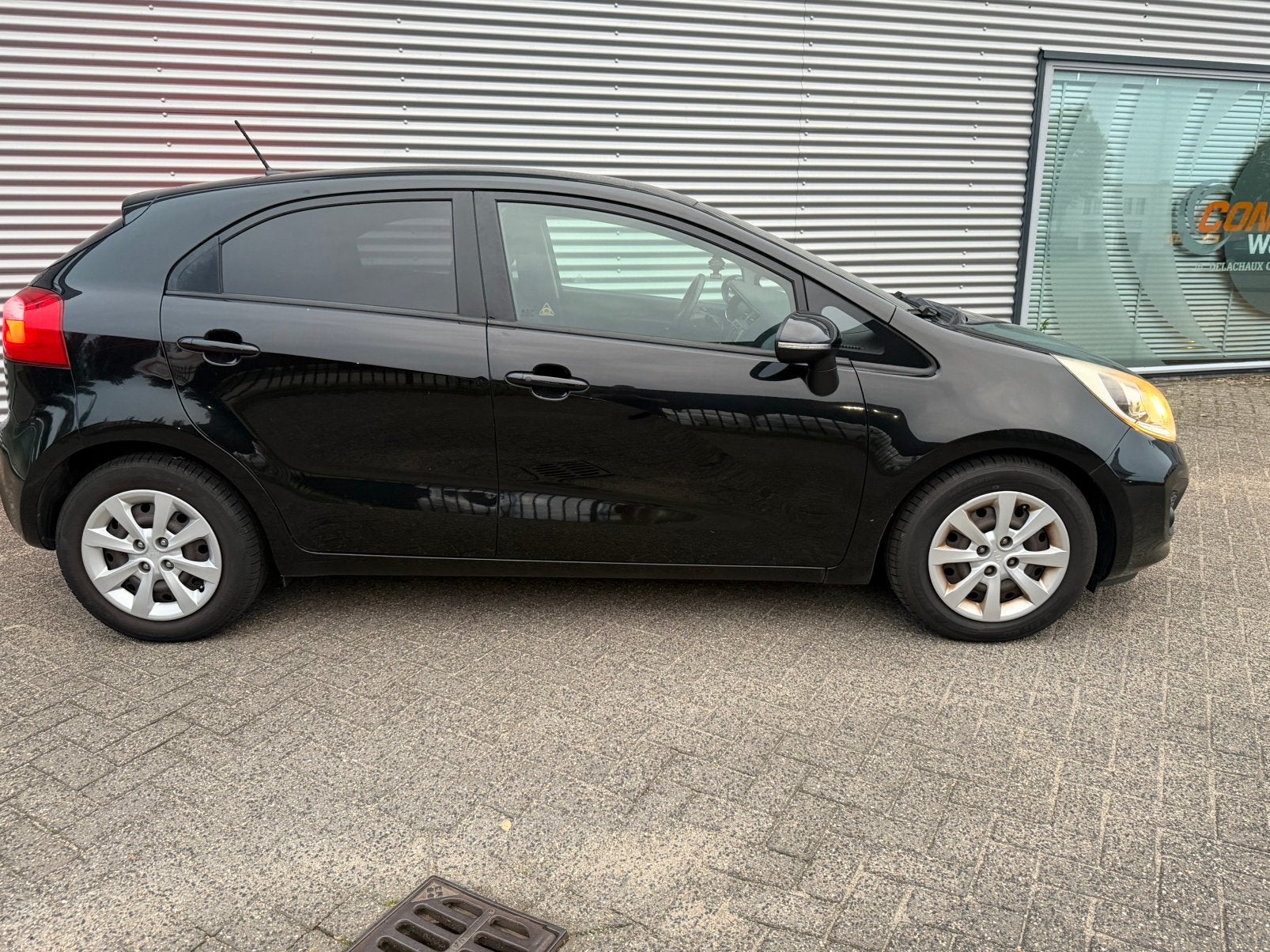 Foto 6 van Kia Rio 1.2 I 5DRS 2012 Zwart super pack. Navigatie,airco.
