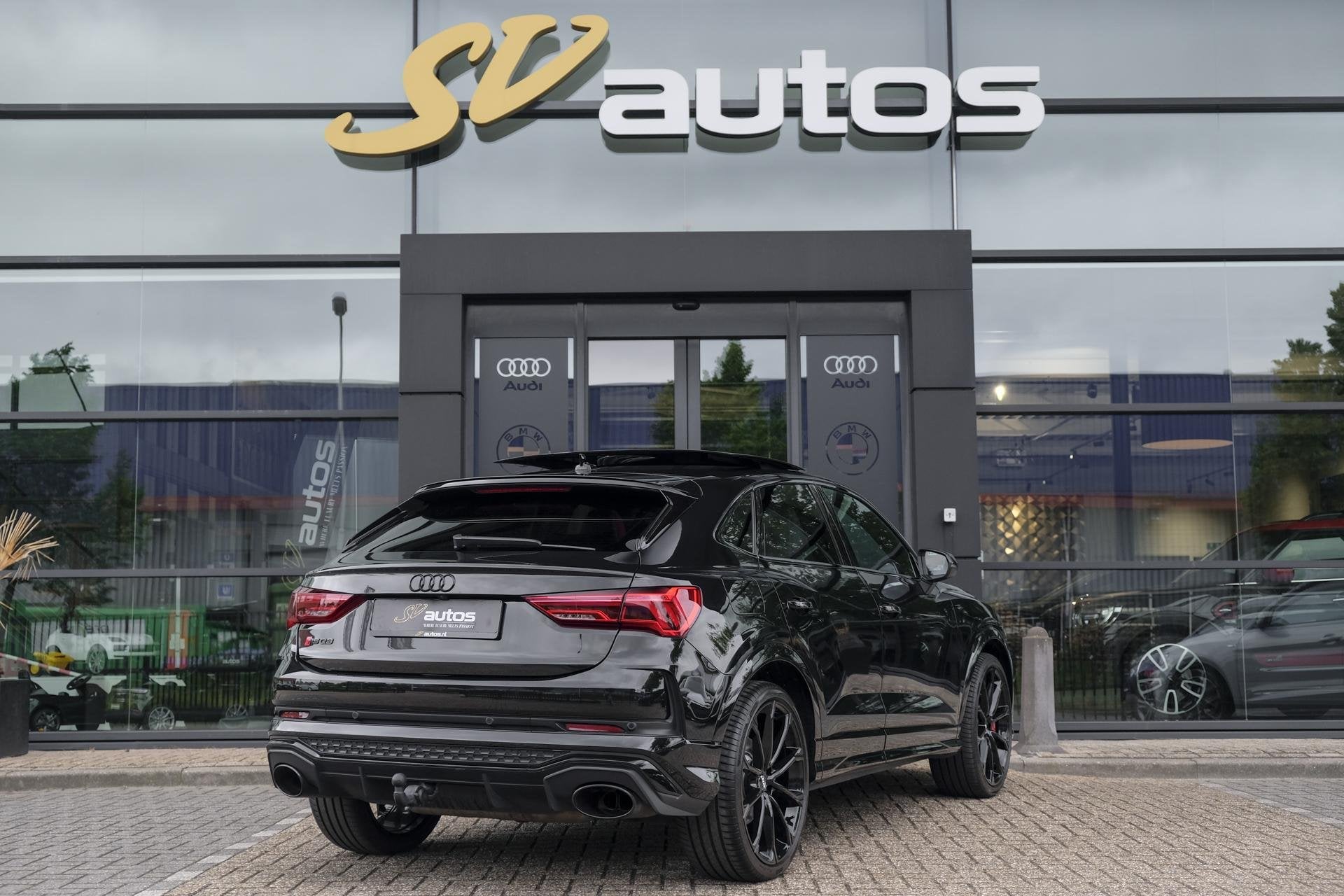 Audi RSQ3 Sportback TFSI 400pk Panoramadak Sonos Trekhaak 21, Automaat, Gebruikt, 1675 kg, Zwart
