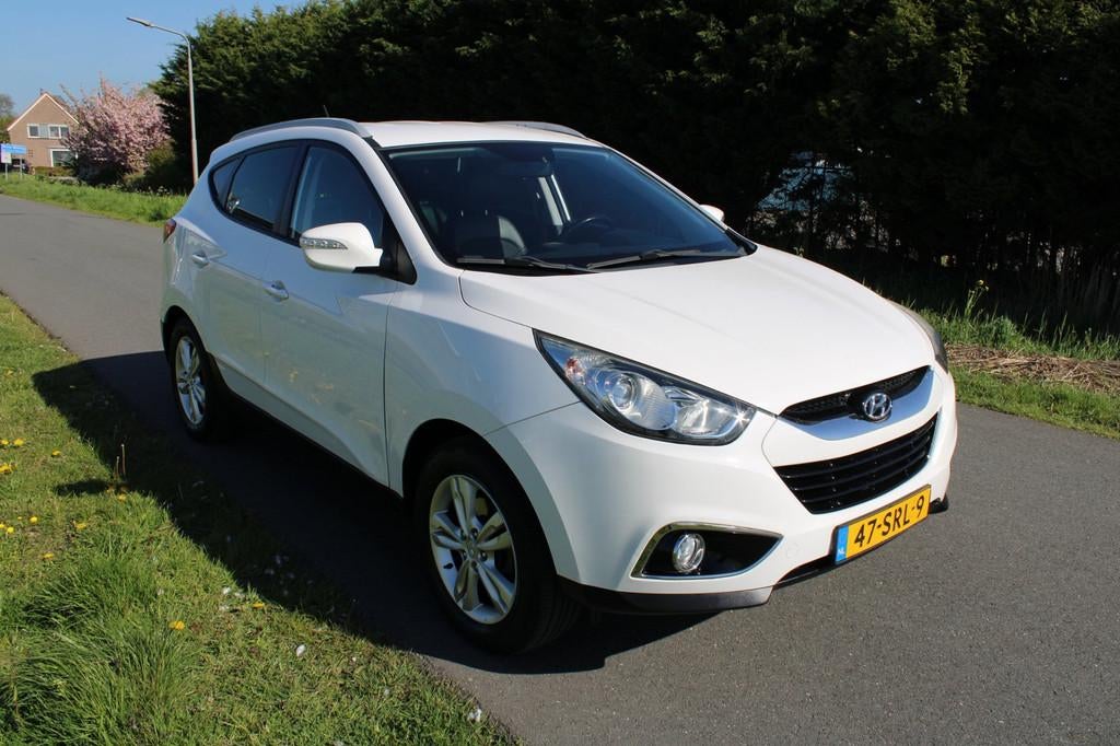Hyundai Ix35 2.0i Business Edition Automaat, Auto's, Gebruikt, Leder en Stof, Origineel Nederlands, 1600 kg