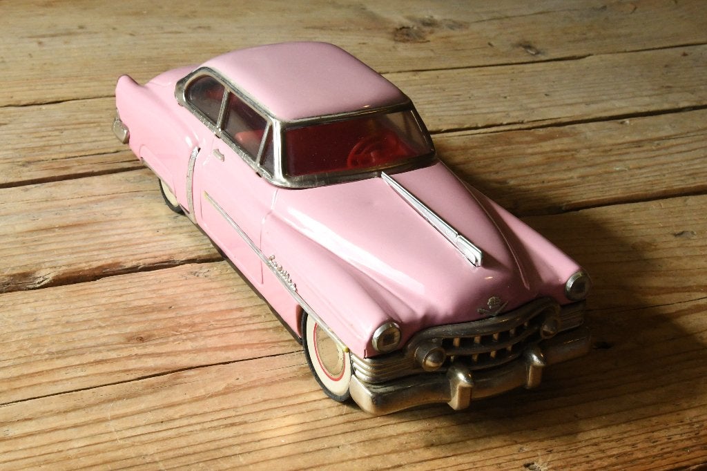 Vintage roze Cadillac speelgoedauto (blik), Antiek en Kunst, Antiek | Speelgoed, Ophalen of Verzenden