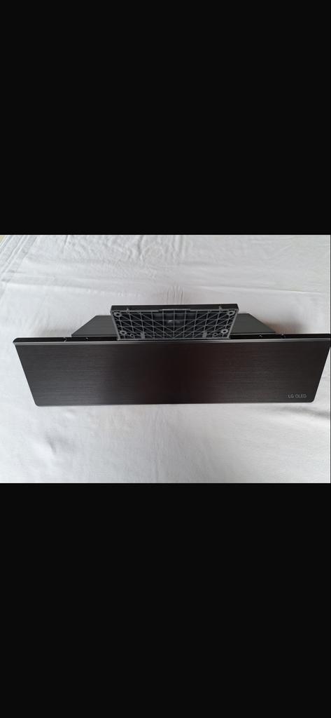 TV Standaard LG OLED 65 inch, Kunststof, Zo goed als nieuw, Minder dan 100 cm, 25 tot 50 cm