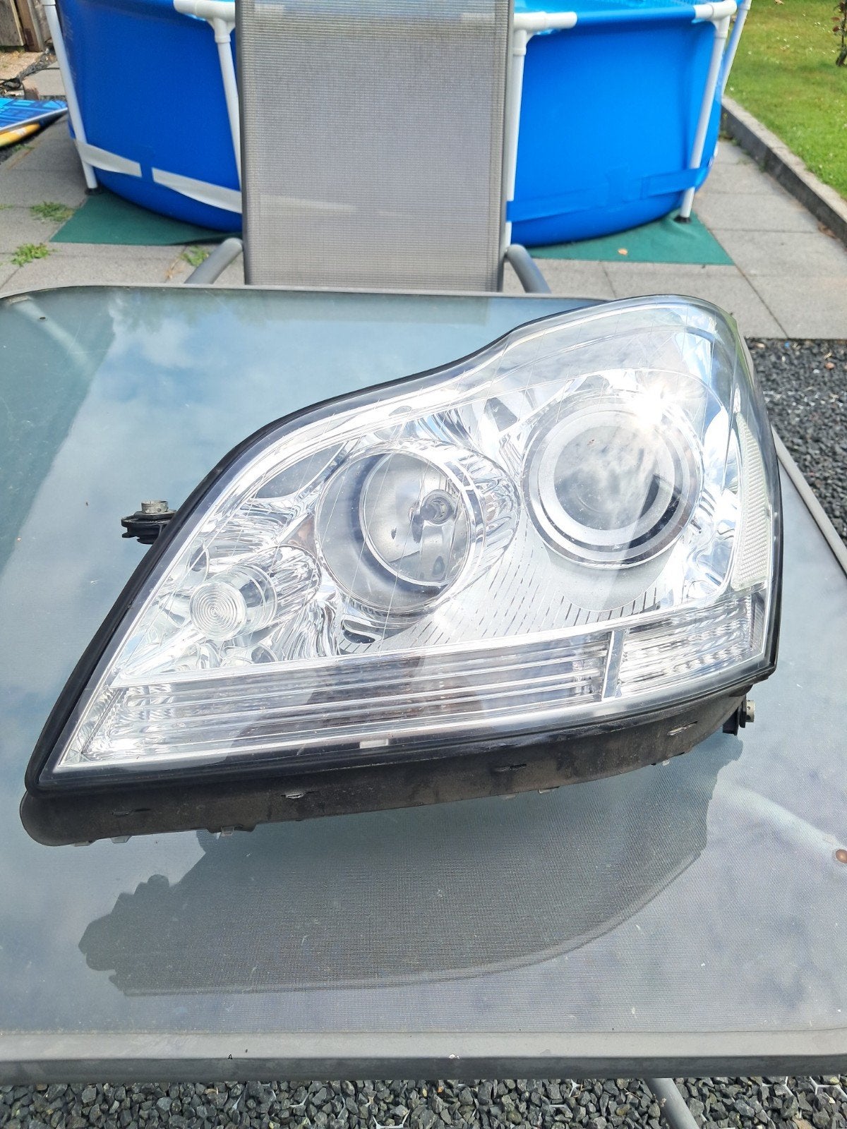 Mercedes Koplampen, Ophalen