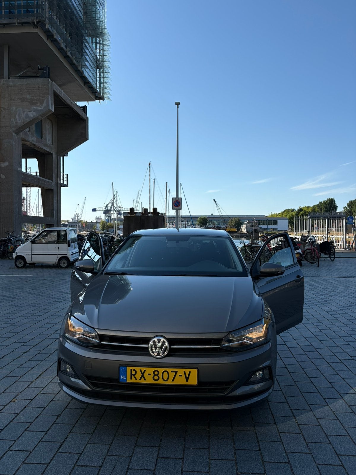 Volkswagen Polo 1.0 TSI 95PK 5D 2018 Grijs, Auto's, Voorwielaandrijving, 40 €/maand, 23 km/l, Origineel Nederlands