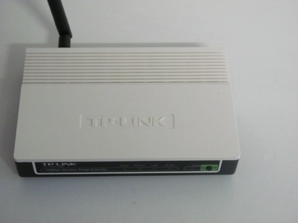 Tp-link 150mbps wireless range extender en voedingsadapter, Ophalen of Verzenden, Zo goed als nieuw, Tplink