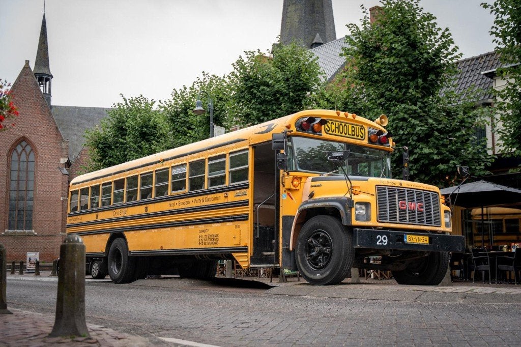 GMC Blue Bird Amerikaanse Schoolbus, Auto's, Automaat, Overige carrosserieën, Geel, Diesel