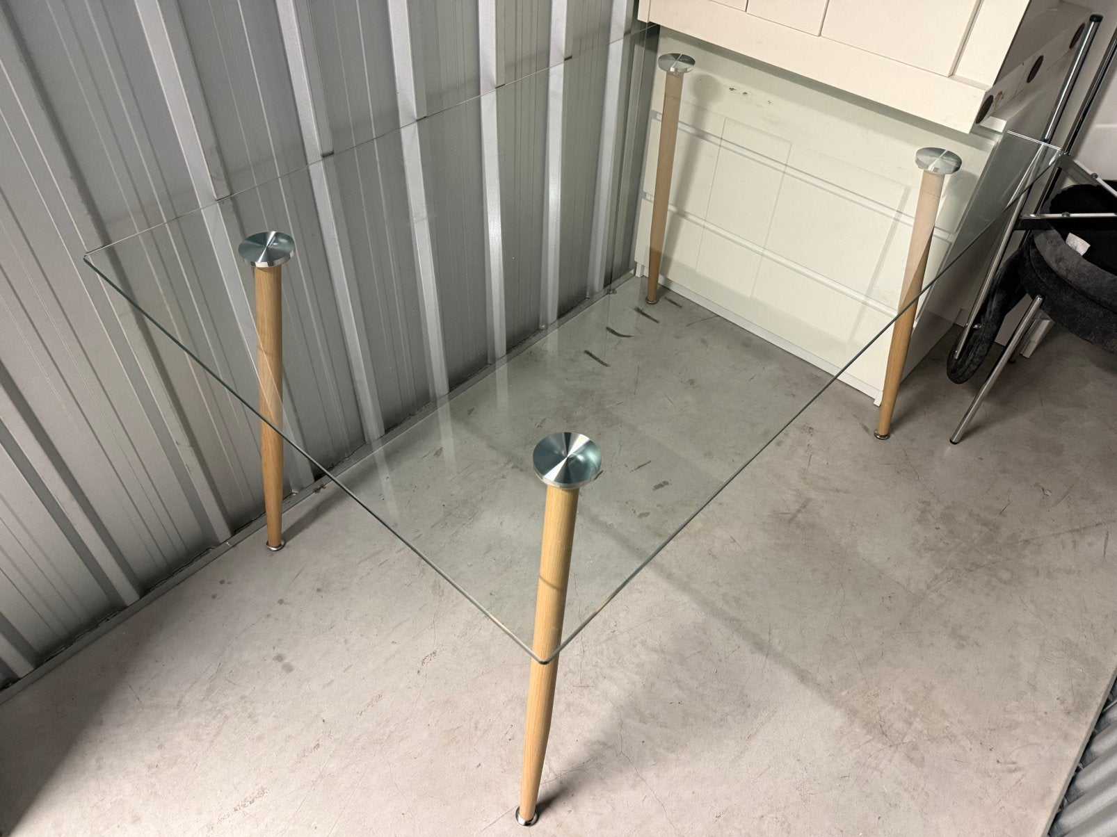 Glass dining table with wood-look legs, Ophalen, Gebruikt, Rechthoekig, 50 tot 100 cm