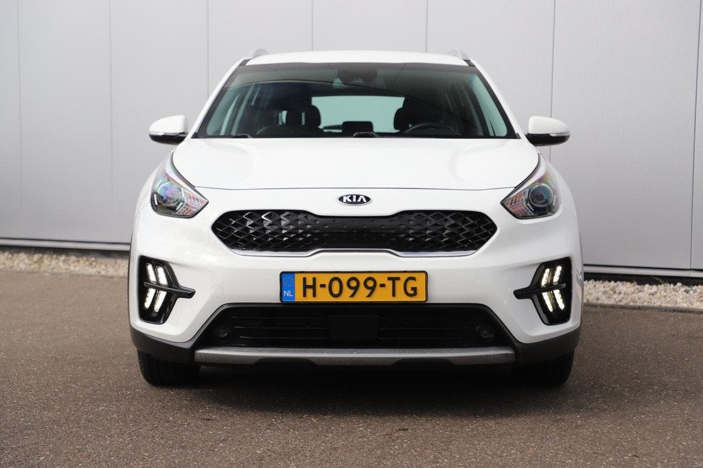 Kia Niro 1.6 GDi Hybrid DynamicLine Navigatie Achteruitrijca, Auto's, Kia, Gebruikt, Euro 6, Leder en Stof, Wit
