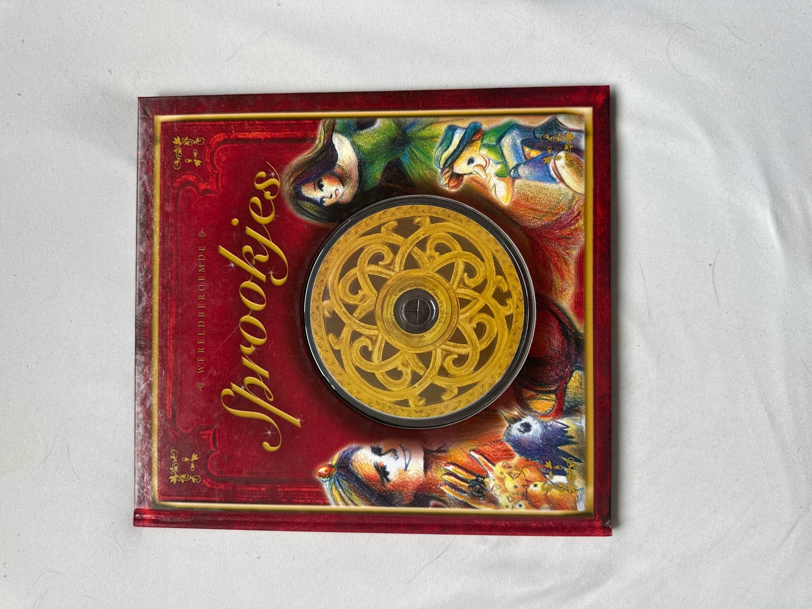 Wereldberoemde Sprookjes boek met CD - Pinokkio, Assepoester, Ophalen of Verzenden, Zo goed als nieuw