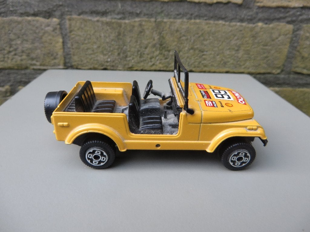 Burago JEEP CJ 7 geel, Ophalen of Verzenden, Gebruikt, Auto, Overige merken