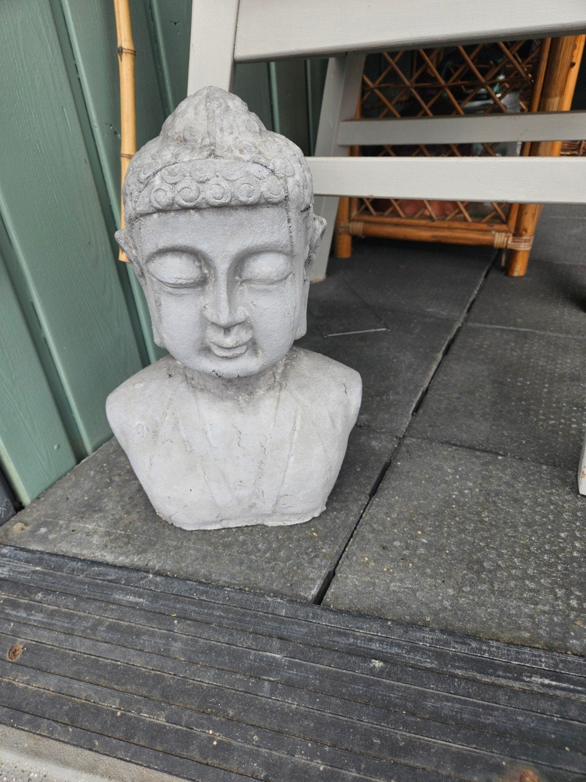 Buddha hoofd., Ophalen