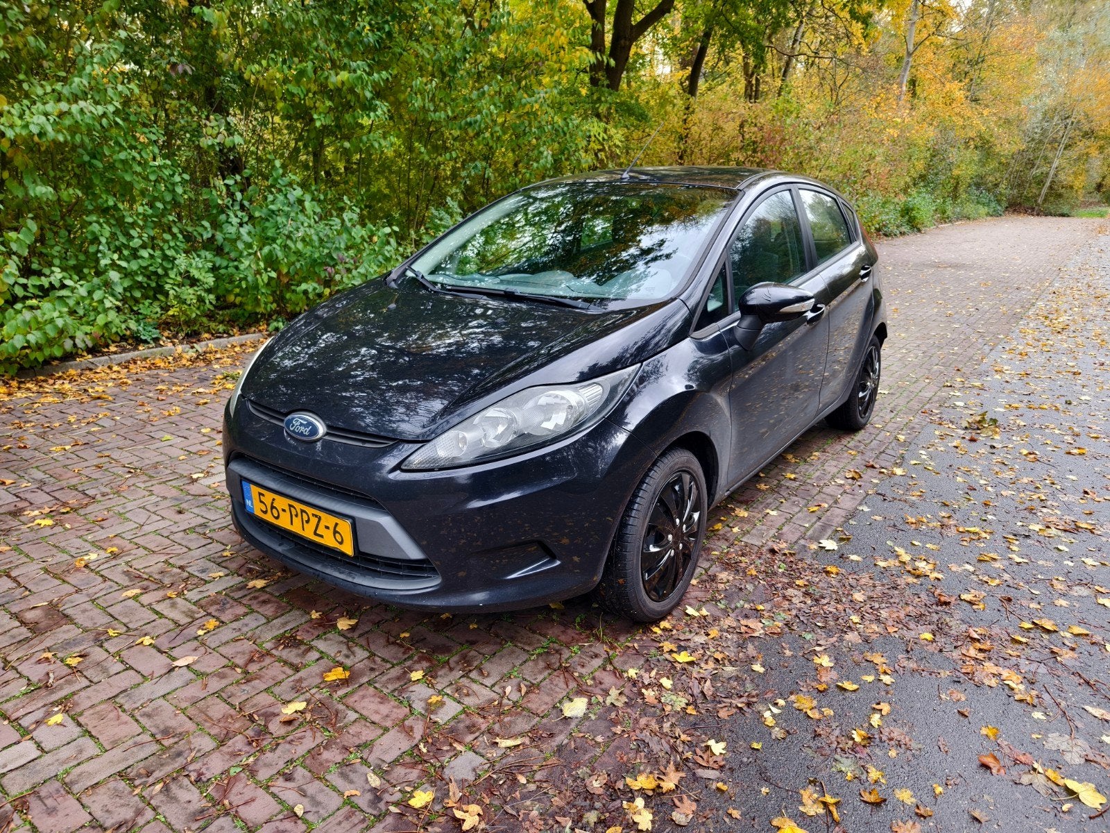 Ford Fiësta 1.25 44KW 5DR 2011 Zwart, Auto's, Ford, Voorwielaandrijving, 40 €/maand, 1242 cc, 4 cilinders