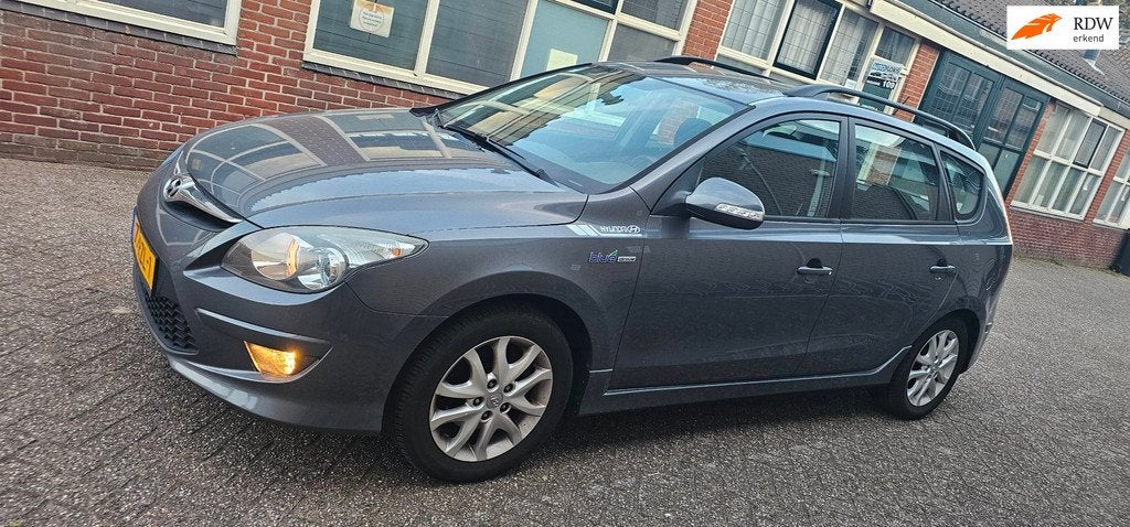 Hyundai I30 CW 1.6i i-Motion clima velgen onderhoudshistorie, Auto's, Gebruikt, 1591 cc, Origineel Nederlands, Handgeschakeld