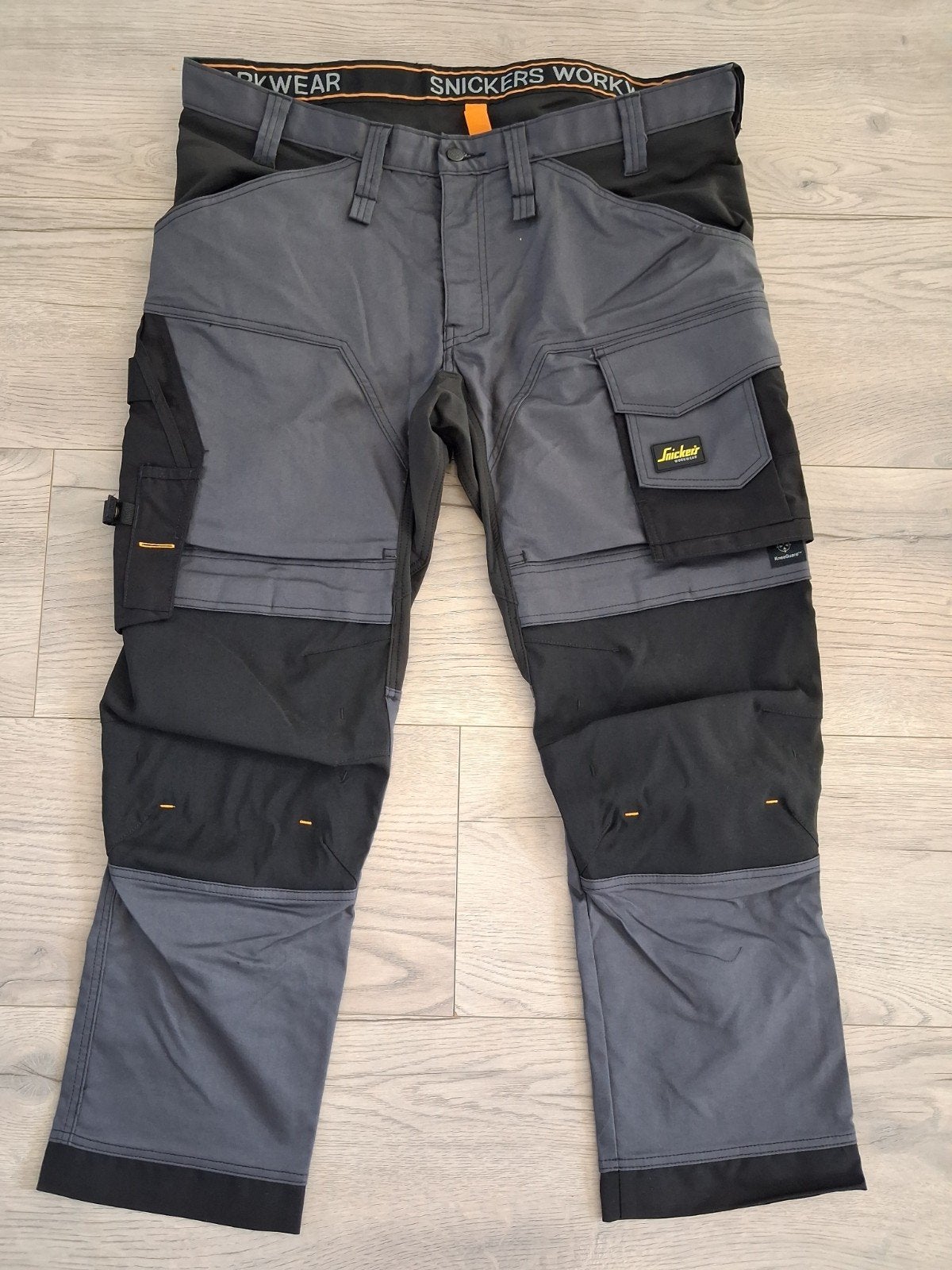Nieuw Snickers werkbroek grijs/zwart maat 56/58, Heren, Snickers Workwear, Nieuw, Ophalen of Verzenden