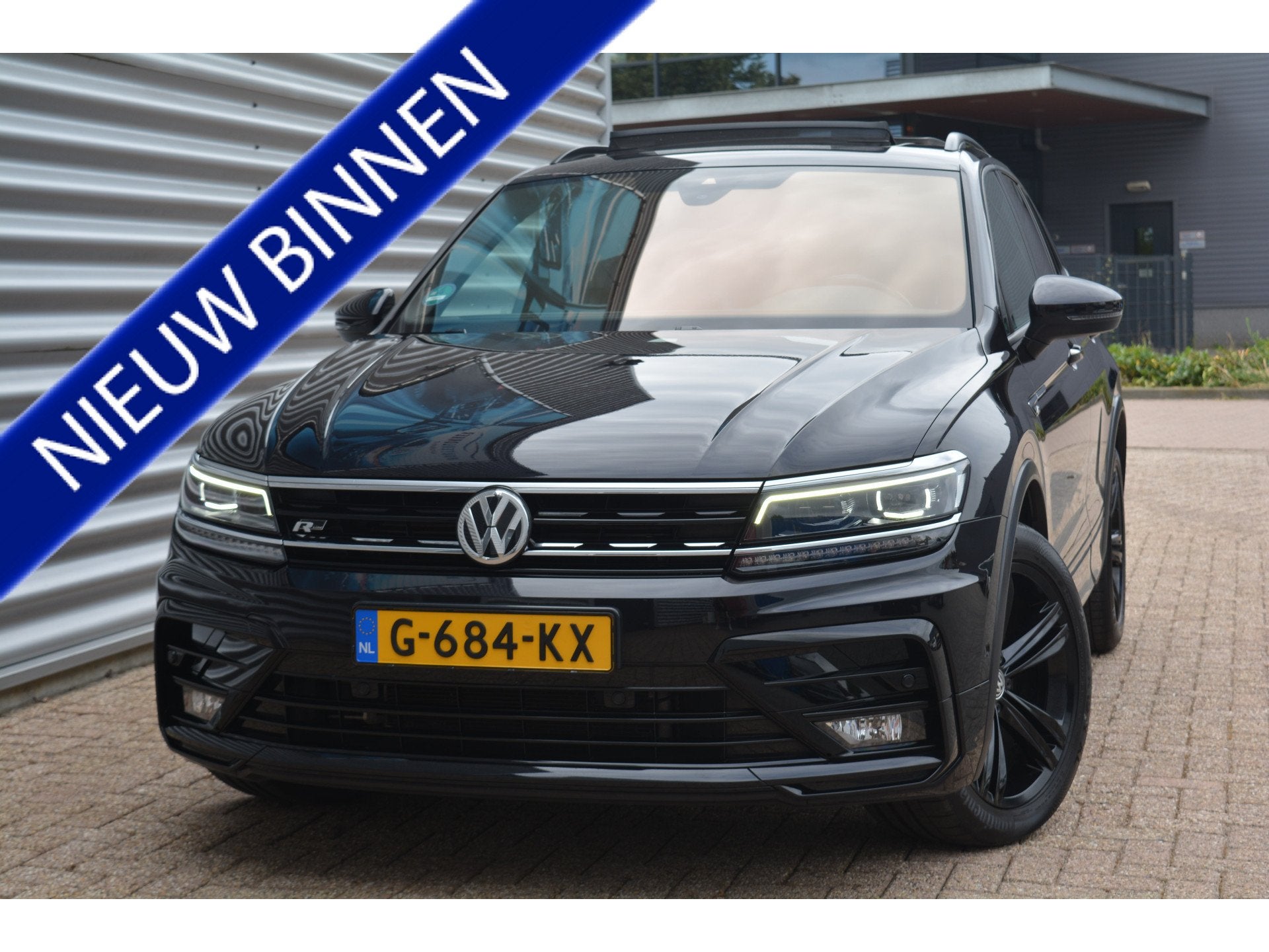 Volkswagen Tiguan 2.0 TSI 4Motion Pano/300PK/DSG/OrgNL, Auto's, Gebruikt, 1984 cc, 2500 kg, Zwart