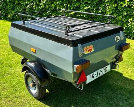 Vakantie aanhanger bagagewagen met deksel, Ophalen