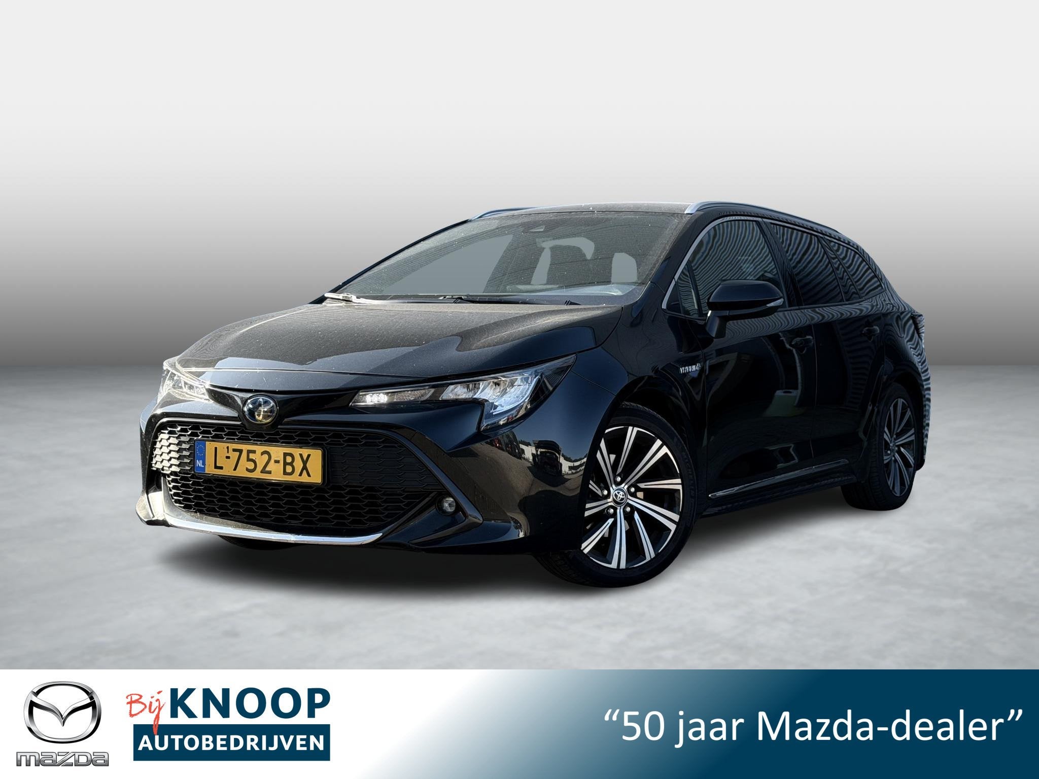 Toyota Corolla Touring Sports 1.8 Hybrid Business Plus, Auto's, Toyota, 1345 kg, 450 kg, Gebruikt, 4 cilinders