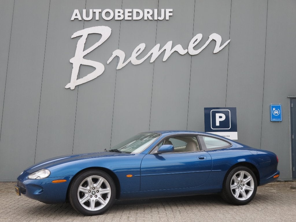Jaguar XK 4.0 Coupe 1996 Blauw, Auto's, Achterwielaandrijving, Blauw, Particulier, Onderhoudsboekje