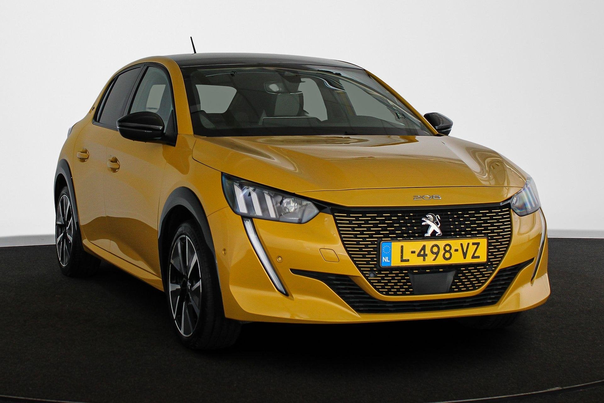 Peugeot e-208 EV GT Pack 50 kWh Stoelverwarming Camera Keyle, Auto diversen, Automaat, Geel, Elektrisch, Peugeot