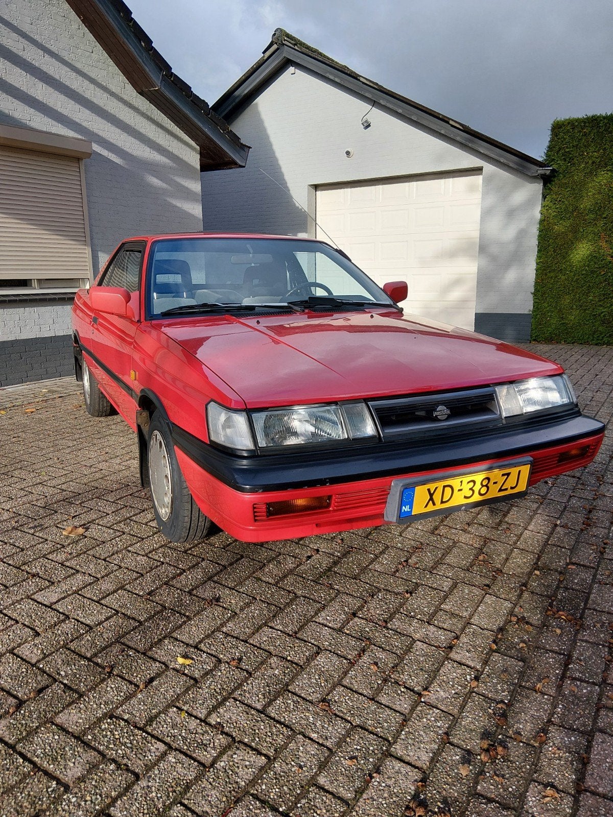 Nissan Sunny 1.6 I Coupe K6 1989 Rood, Auto's, Voorwielaandrijving, Origineel Nederlands, Handgeschakeld, Particulier