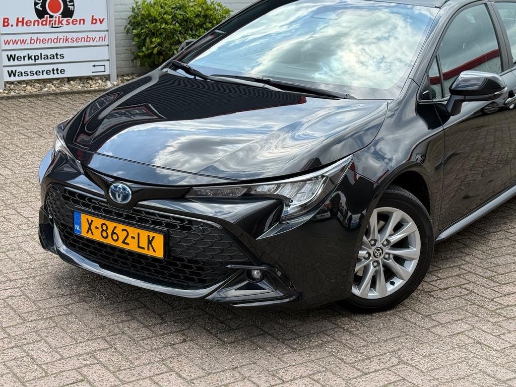 Toyota Corolla Touring Sports 1.8 Hybrid 122pk CVT Active/ T, Gebruikt, 4 cilinders, Corolla, Zwart