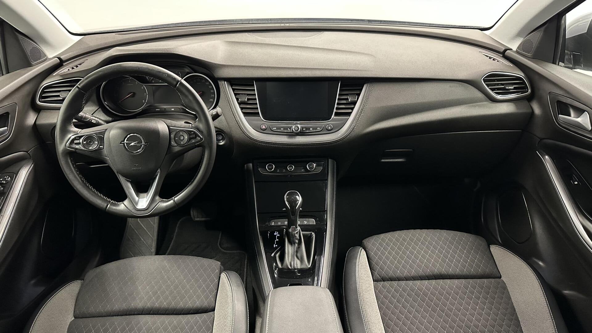 Opel Grandland X 1.2 Turbo Business Executive CAMERA CARPLAY, Gebruikt, 1199 cc, Met garantie (alle), Leder en Stof