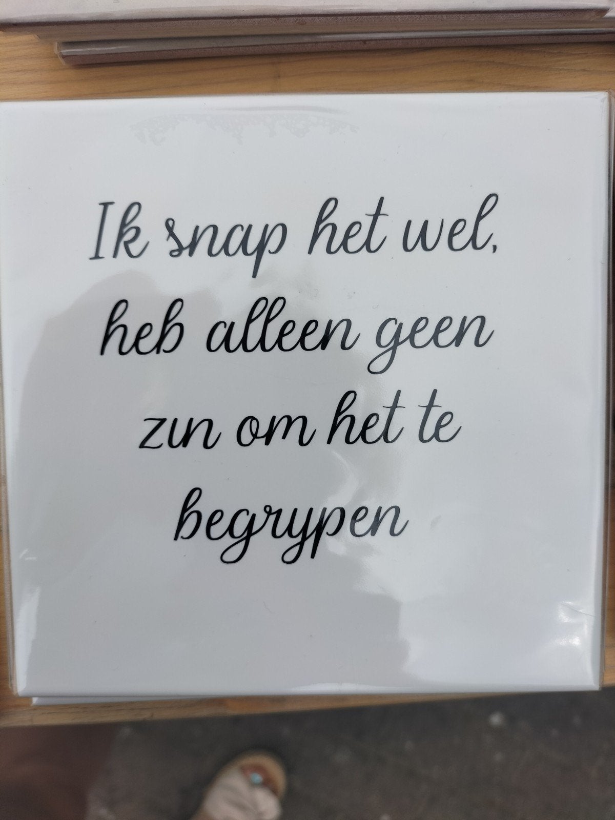 Spreuken tegeltjes, Ophalen