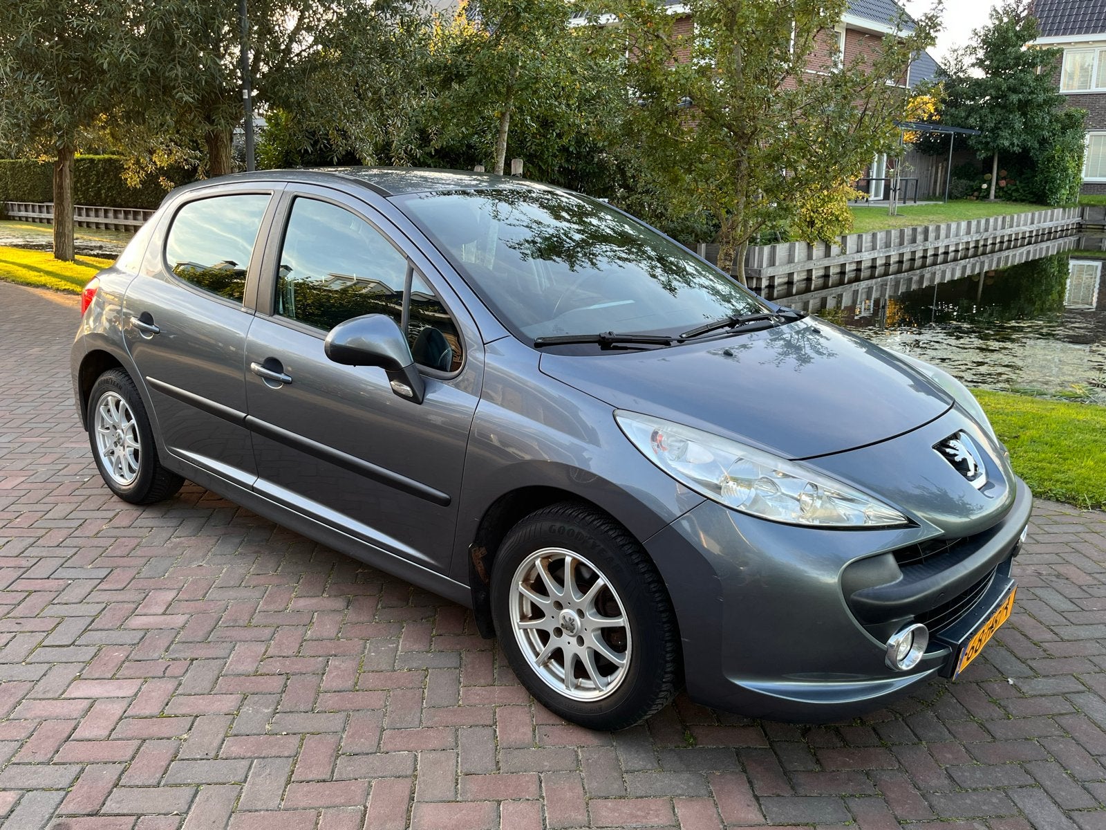Peugeot 207 1.4 VTI 16V LPG 5DRS 2009 Grijs, Auto's, Voorwielaandrijving, Zwart, 1193 kg, Origineel Nederlands
