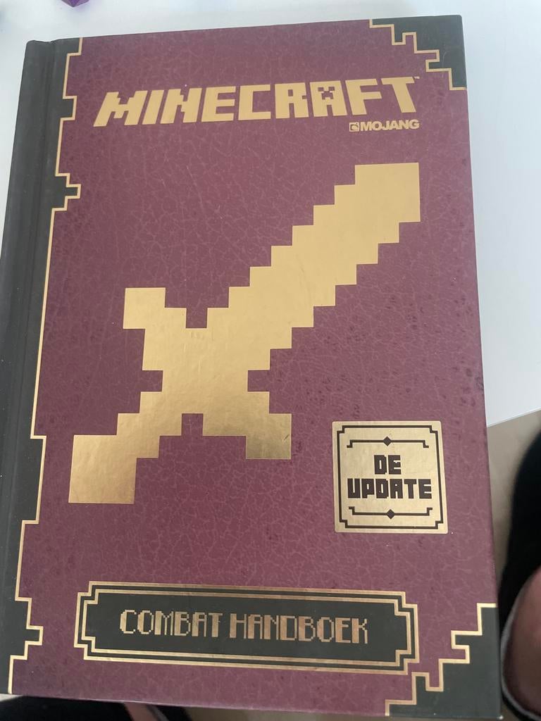 Minecraft Combat Handboek - De Update, Ophalen of Verzenden, Zo goed als nieuw, Non-fictie