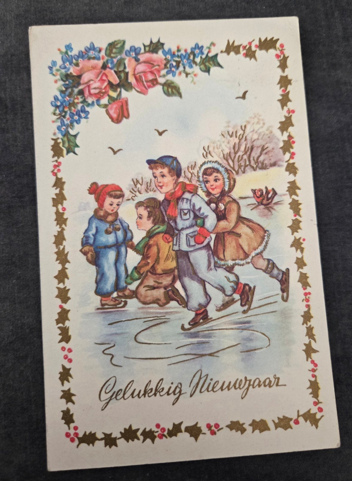 Vintage Nieuwjaarskaart Schaatsende Kinderen (1952), Verzenden, 1940 tot 1960, Gelopen, Feest(dag)