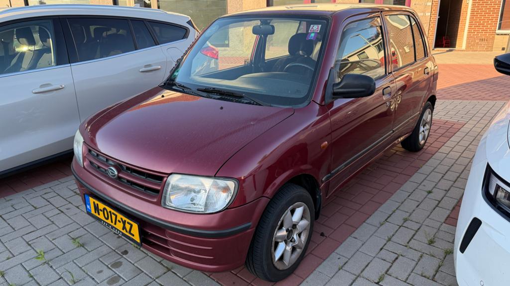Daihatsu Cuore 1.0 1999 Rood, Voorwielaandrijving, Stof, Cuore, Handgeschakeld