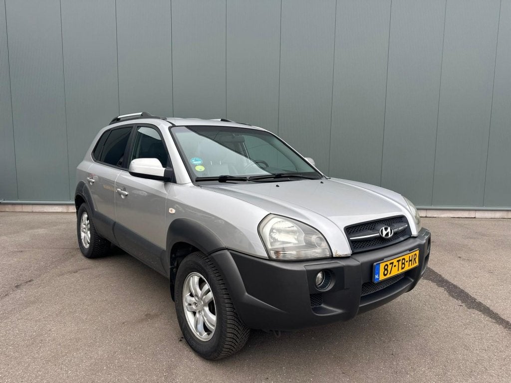 Hyundai Tucson 2.0i Style LEDER | CLIMA | TREKHAAK !, Auto's, 142 pk, 4 cilinders, Origineel Nederlands, Handgeschakeld