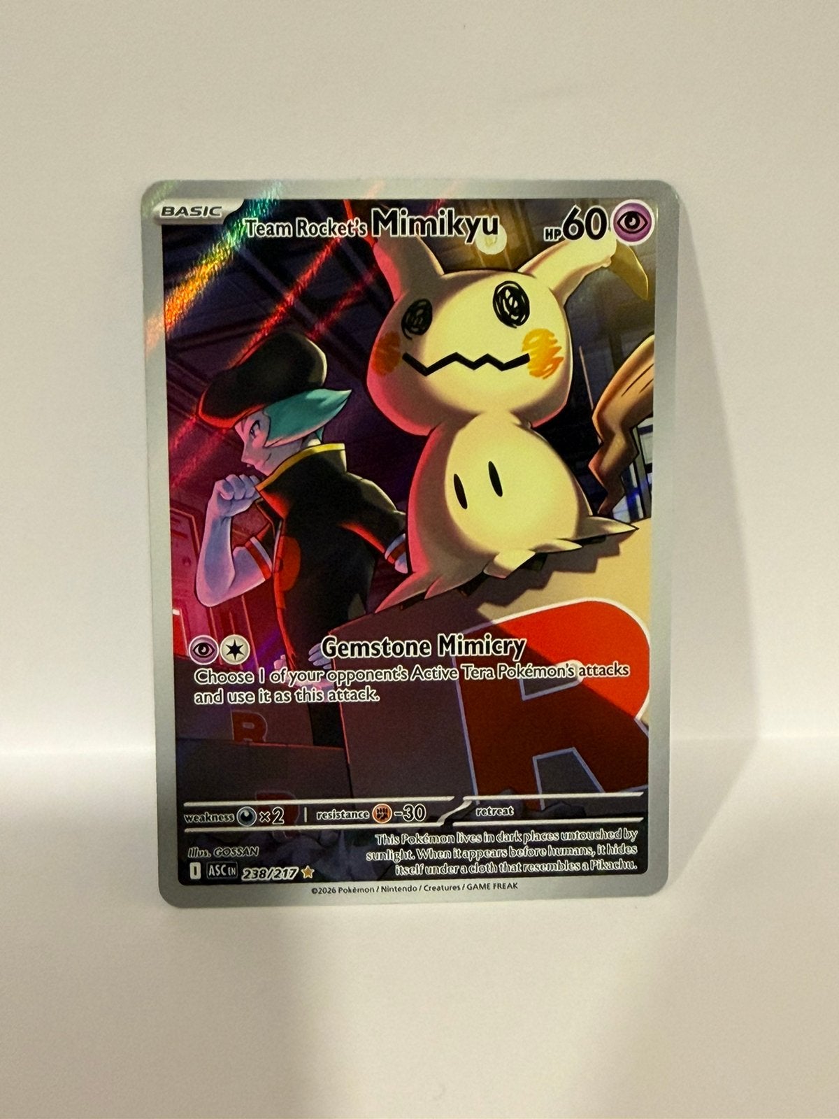 Team Rocket's Mimikyu 238, Ophalen of Verzenden, Zo goed als nieuw