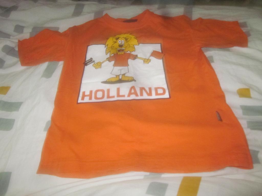Oranje/wit/zwart shirtje Leeuw met vlaggetjes Holland ZJ 128, Verzenden, Jongen of Meisje, Zo goed als nieuw, ZJ