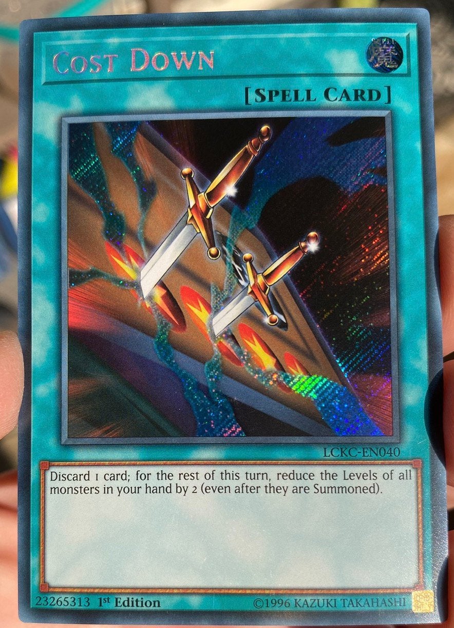 Yu-Gi-Oh! Cost Down LCKC 1st Edition !, Hobby en Vrije tijd, Verzamelkaartspellen | Yu-gi-Oh!, Ophalen of Verzenden, Zo goed als nieuw