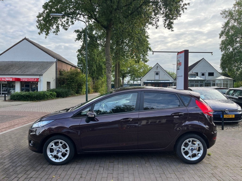 Ford FIESTA 1.4 GHIA AUTOMAAT 5-DEURS / AIRCO / RADIO-CD / E, 15 km/l, Fiësta, 550 kg, 900 kg