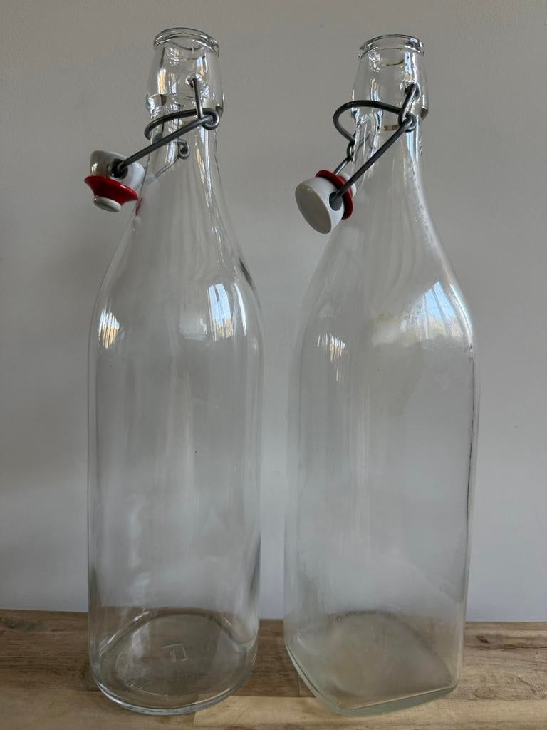 Twee beugelflessen 1L - Ideaal voor drankjes, Ophalen of Verzenden, Gebruikt