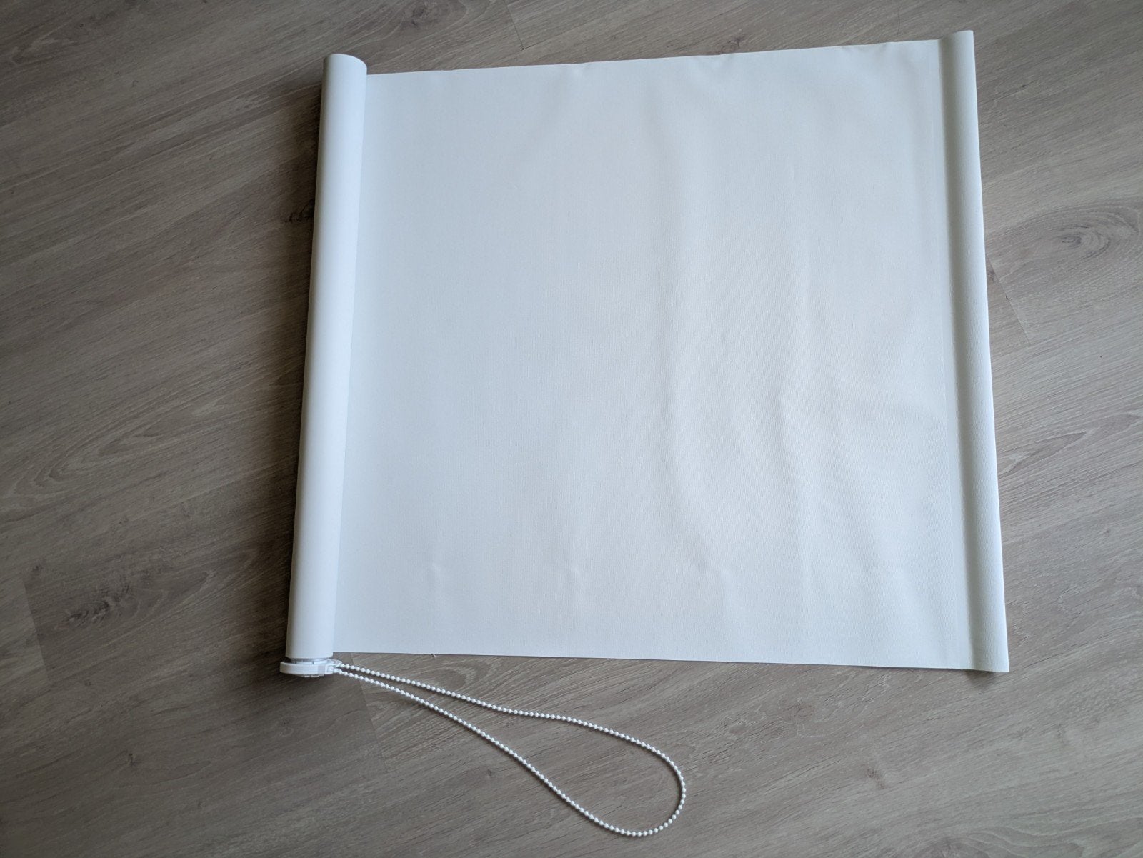 Rolgordijn verduisterend wit 75 cm breed nieuw, Verduisterend, Wit, 75 cm, Ophalen of Verzenden