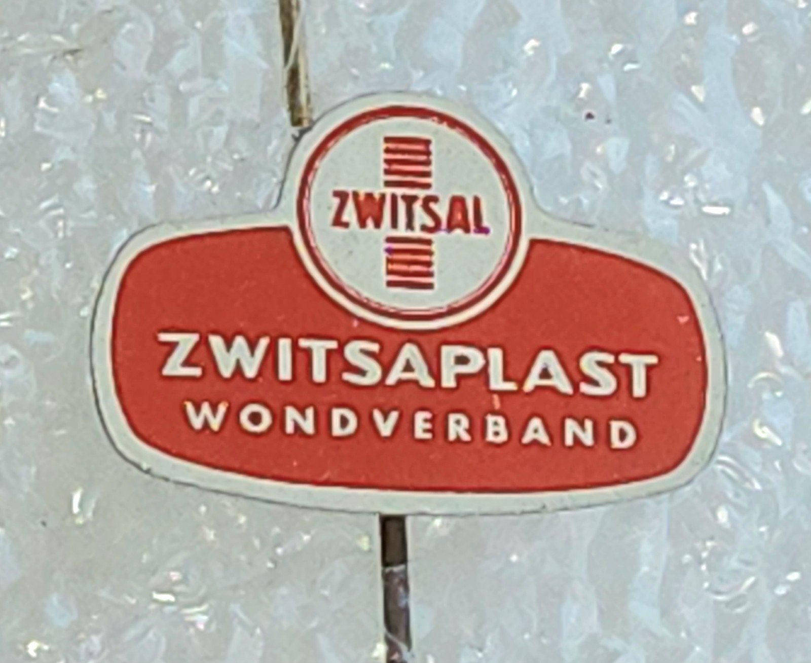 Vintage Zwitsal Zwitsaplast Wondverband Speldje, Ophalen of Verzenden, Gebruikt, Overige onderwerpen, Speldje of Pin