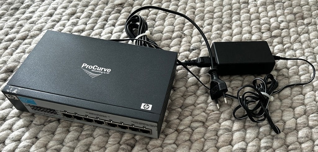 HP ProCurve switch 8 poorts, Computers en Software, Netwerk switches, Ophalen of Verzenden, Gebruikt