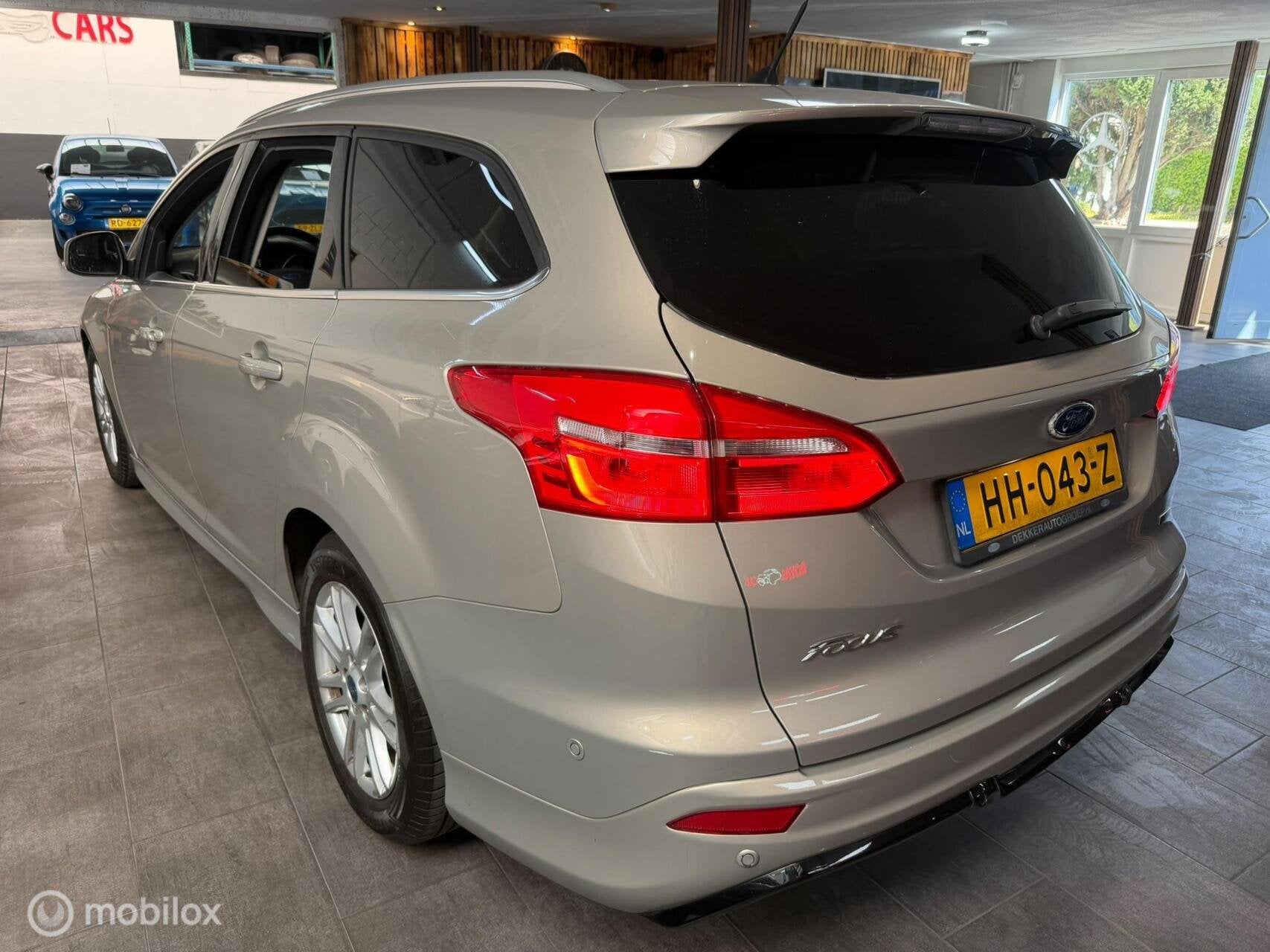 Ford Focus Wagon 1.5 Titanium Edition|Camera|NAVI|AUTOMAAT, 4 cilinders, 150 pk, 690 kg, Zilver of Grijs