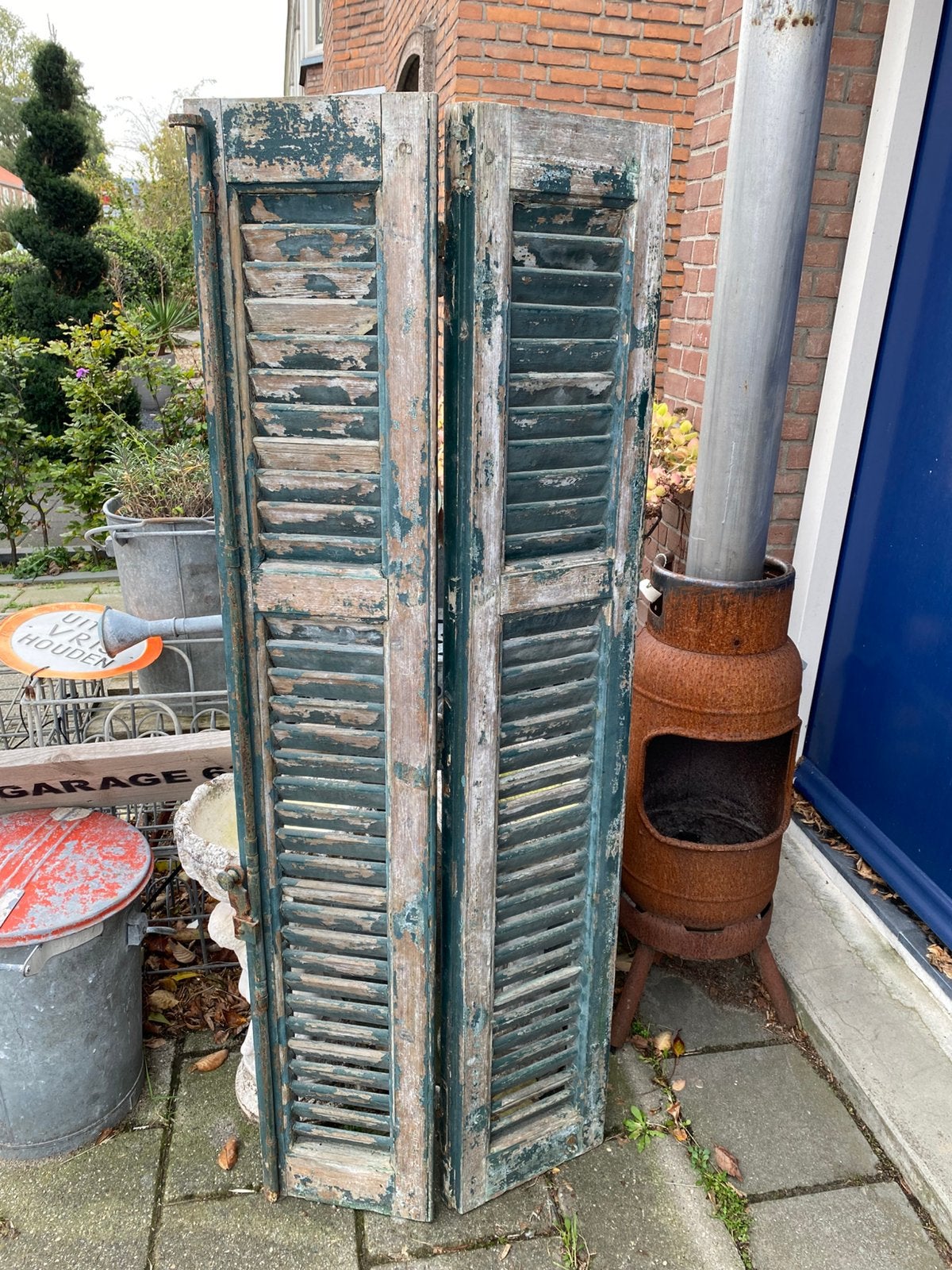 Twee houten luiken uit Frankrijk, Ophalen