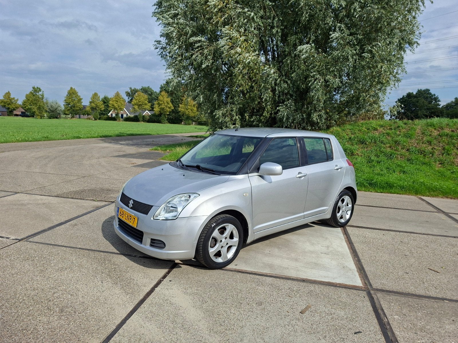 Suzuki Swift 1.3 5D 2007 Grijs met nieuwe apk, Auto's, Voorwielaandrijving, Stof, 40 €/maand, 965 kg