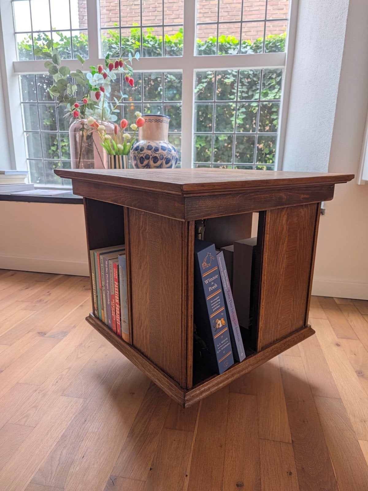 Antieke boekenmolen, Ophalen