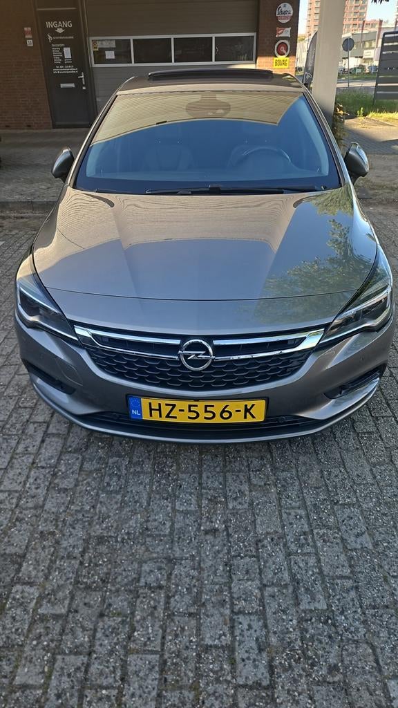 Opel Astra 1.4 Turbo 110KW 5D 2016 Bruin, Auto's, Opel, Voorwielaandrijving, Zwart, Bruin, 620 kg