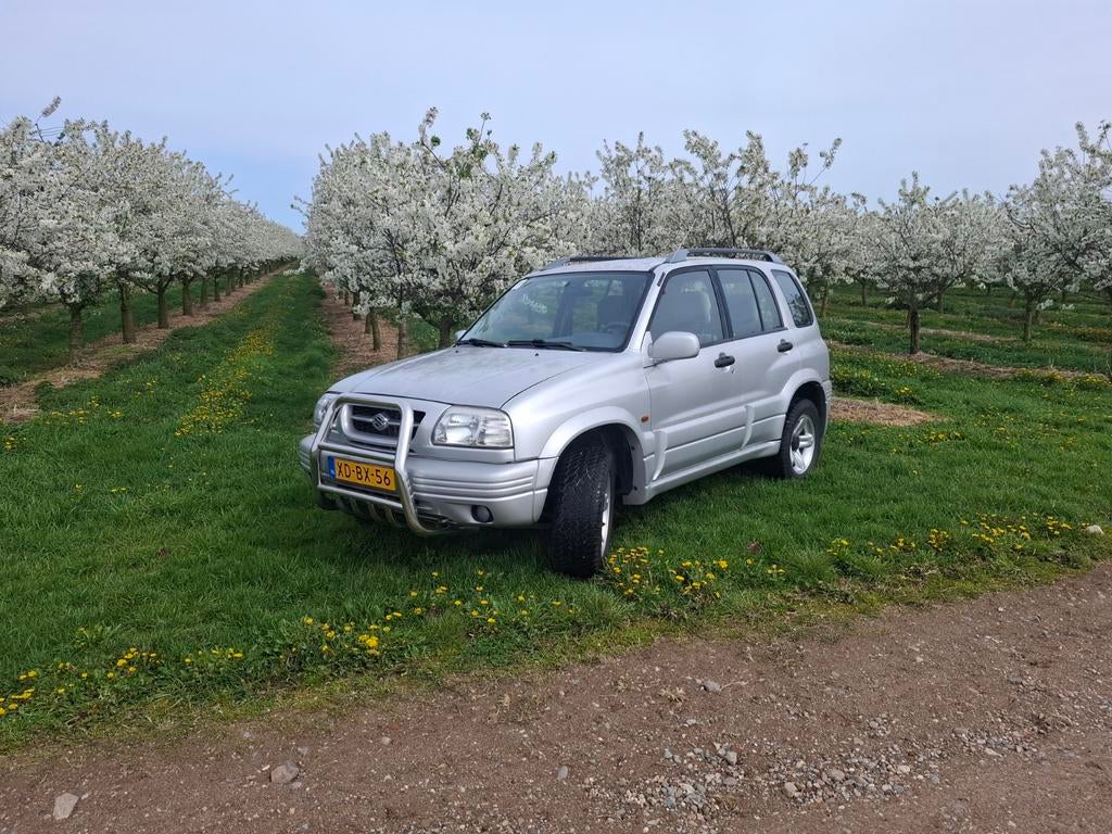 Suzuki Grand Vitara 2.5 V6 5D AUT 1998 Grijs, Automaat, 1380 kg, Grand Vitara, Origineel Nederlands